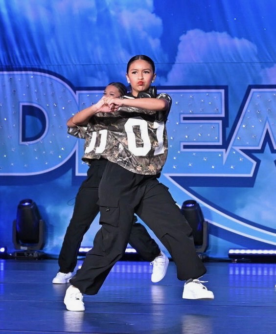 IMPACT hip hop duo performing on stage
